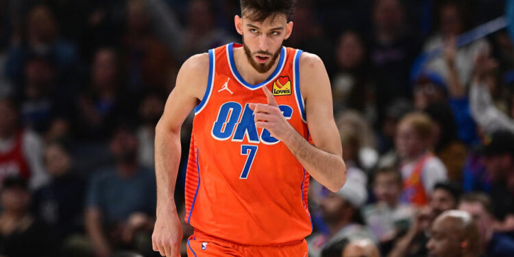 Chet Holmgren landed on his hip hard under the basket after trying to contest an Andrew Wiggins layup on Saturday night.