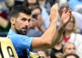 Novak Djokovic claps to the crowd at the 2024 US Open