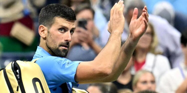 Novak Djokovic claps to the crowd at the 2024 US Open