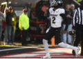 Colorado's quarterback Shedeur Sanders (2) celebrates his touchdown against Texas Tech during the second half of an NCAA college football game, Saturday, Nov. 9, 2024, in Lubbock, Texas. (AP Photo/Annie Rice)