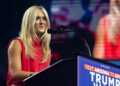 Former competitve swimmer Riley Gaines speaks during a campaign rally for Republican presidential nominee, former U.S. President Donald Trump at Desert Diamond Arena on August 23, 2024, in Glendale, Arizona. The rally, held in partnership with Turning Point PAC and Turning Point Action, came two weeks after Democratic presidential nominee U.S. Vice President Harris held a rally at the same location. 