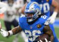 Detroit Lions running back Jahmyr Gibbs runs with the ball