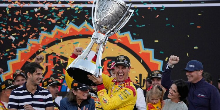 Joey Logano holds the title