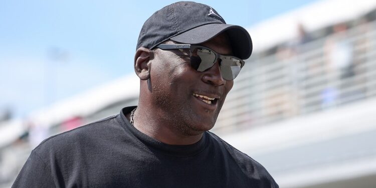 Michael Jordan, NBA Hall of Famer and co-owner of 23XI Racing, walks the grid prior to the NASCAR Cup Series Straight Talk Wireless 400 at Homestead-Miami Speedway on Oct. 27, 2024 in Homestead, Florida.