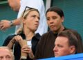 Sam Kerr and Kristie Mewis look on during the Premier League match between Chelsea FC and Manchester City FC at Stamford Bridge on August 18, 2024 in London, England. 