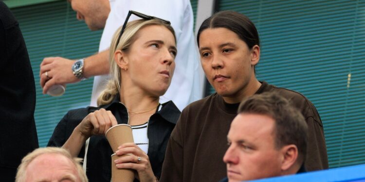 Sam Kerr and Kristie Mewis look on during the Premier League match between Chelsea FC and Manchester City FC at Stamford Bridge on August 18, 2024 in London, England. 