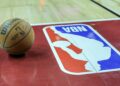 NBA logo on a basketball court