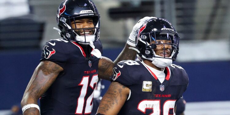 Nico Collins and Joe Mixon celebrate touchdown