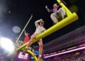 Ole Miss fans on goal post