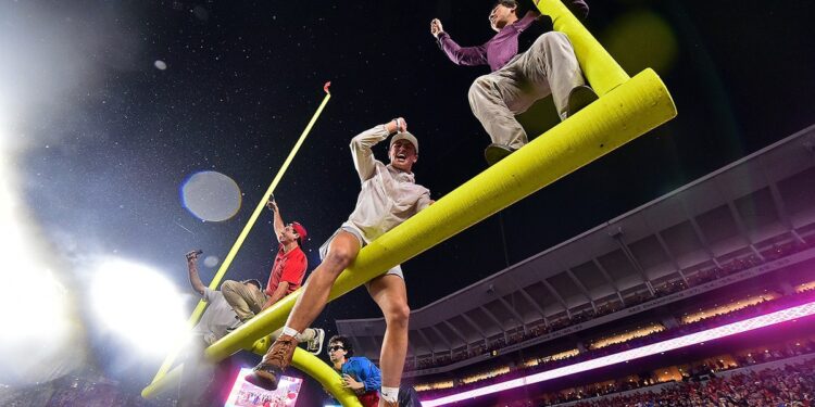 Ole Miss fans on goal post