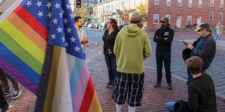 Salem, MA - November 8: Protesters in front of Seth Moulton’s office. 