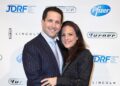 Adam Schefter with wife