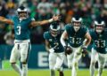 Philadelphia Eagles safety Reed Blankenship celebrates with teammates after his interception during the fourth quarter against the Washington Commanders at Lincoln Financial Field. Mandatory Credit: Bill Streicher-Imagn Images