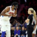 Joel Embiid charged into Victor Wembanyama, and then erupted at the officials after being called for the offensive foul.