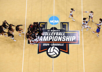 LOUISVILLE, KENTUCKY - DECEMBER 19: The Louisville Cardinals celebrate their victory over the Pitt Panthers during the Division I Women's Volleyball Semifinals held at the KFC YUM! Center on December 19, 2024 in Louisville, Kentucky.  (Photo by Jamie Schwaberow/NCAA Photos via Getty Images)