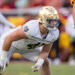 LOS ANGELES, CA - NOVEMBER 30: Donovan Hinish #41 of the Notre Dame Fighting Irish on the line of scrimmage during a game between Notre Dame Fighting Irish and University of Southern California at Los Angeles Memorial Coliseum on November 30, 2024 in Los Angeles, California. (Photo by Melinda Meijer/ISI Photos/Getty Images)