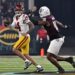 USC quarterback Jayden Maiava looks to pass under pressure from Texas A&M defensive lineman Cashius Howell.