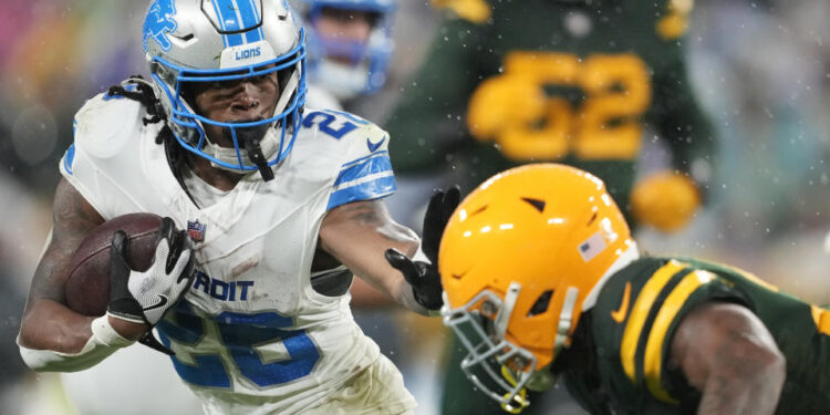 Jahmyr Gibbs and the Detroit Lions beat the Green Bay Packers in the first meeting between the teams this season. (Photo by Patrick McDermott/Getty Images)