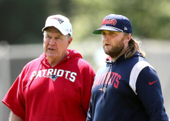 Steve Belichick, right, will reportedly reunite with his father Bill Belichick on North Carolina's coaching staff.  (John Tlumacki/The Boston Globe via Getty Images)