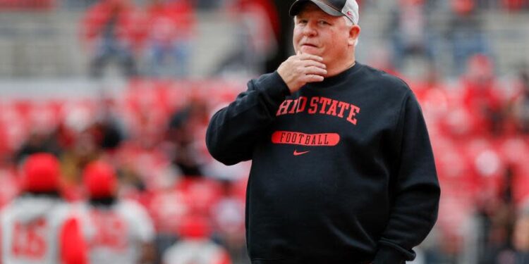 Ohio State offensive coordinator Chip Kelly stands on the field before a game against Indiana on Nov. 23.