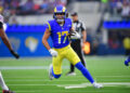 Dec 8, 2024; Inglewood, California, USA; Los Angeles Rams wide receiver Puka Nacua (17) runs the ball against the Buffalo Bills during the first half at SoFi Stadium. Mandatory Credit: Gary A. Vasquez-Imagn Images