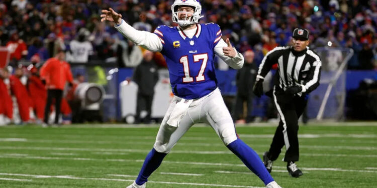 Buffalo Bills quarterback Josh Allen (17) makes an off balance for a 13-yard touchdown to Buffalo Bills wide receiver Khalil Shakir (10).. PHOTO USA TODAY SPORTS IMAGES