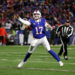 Buffalo Bills quarterback Josh Allen (17) makes an off balance for a 13-yard touchdown to Buffalo Bills wide receiver Khalil Shakir (10).. PHOTO USA TODAY SPORTS IMAGES