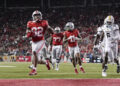 Sep 7, 2024; Columbus, Ohio, USA; Ohio State Buckeyes running back TreVeyon Henderson (32) runs for a touchdown against the Western Michigan Broncos during the second half at Ohio Stadium. Mandatory Credit: Adam Cairns-Imagn Images