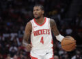 Oct 17, 2024; Houston, Texas, USA; Houston Rockets guard Jalen Green (4) dribbles against the San Antonio Spurs in the fourth quarter at Toyota Center. Mandatory Credit: Thomas Shea-Imagn Images