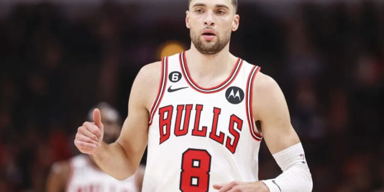 Dec 7, 2022; Chicago, Illinois, USA; Chicago Bulls guard Zach LaVine (8) reacts after scoring against the Washington Wizards during the first half at United Center. Mandatory Credit: Kamil Krzaczynski-USA TODAY Sports