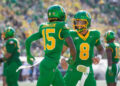 Oregon Ducks quarterback Dillon Gabriel and Oregon Ducks wide receiver Tez Johnson celebrate a touchdown by Johnson as the Oregon Ducks host the Idaho Vandals Saturday, Aug. 31, 2024 at Autzen Stadium in Eugene, Ore. PHOTO USA TODAY SPORTS IMAGES