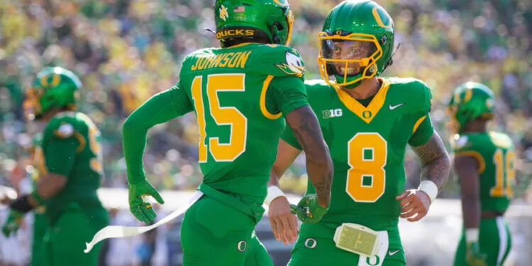 Oregon Ducks quarterback Dillon Gabriel and Oregon Ducks wide receiver Tez Johnson celebrate a touchdown by Johnson as the Oregon Ducks host the Idaho Vandals Saturday, Aug. 31, 2024 at Autzen Stadium in Eugene, Ore. PHOTO USA TODAY SPORTS IMAGES