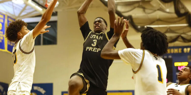 Utah Prep's AJ Dybantsa drives to the basket on Highland's Jemal Smith, left, and Josh Hamilton during a game at Emmanuel College in Boston on Tuesday, Nov. 5, 2024. PHOTO USA TODAY SPORTS IMAGES