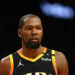 Dec 3, 2024; Phoenix, Arizona, USA; Phoenix Suns forward Kevin Durant (35) against the San Antonio Spurs in the first half of an NBA Cup game at Footprint Center. Mandatory Credit: Mark J. Rebilas-Imagn Images