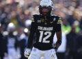 Nov 29, 2024; Boulder, Colorado, USA; Colorado Buffaloes wide receiver Travis Hunter (12) during the first quarter against the Oklahoma State Cowboys at Folsom Field. Mandatory Credit: Ron Chenoy-Imagn Images