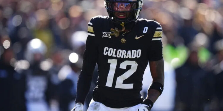 Nov 29, 2024; Boulder, Colorado, USA; Colorado Buffaloes wide receiver Travis Hunter (12) during the first quarter against the Oklahoma State Cowboys at Folsom Field. Mandatory Credit: Ron Chenoy-Imagn Images