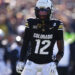 Nov 29, 2024; Boulder, Colorado, USA; Colorado Buffaloes wide receiver Travis Hunter (12) during the first quarter against the Oklahoma State Cowboys at Folsom Field. Mandatory Credit: Ron Chenoy-Imagn Images