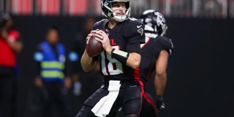 Dec 1, 2024; Atlanta, Georgia, USA; Atlanta Falcons quarterback Kirk Cousins (18) drops back to pass against the Los Angeles Chargers in the fourth quarter at Mercedes-Benz Stadium. Mandatory Credit: Brett Davis-Imagn Images