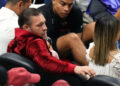 Jun 9, 2023; Miami, Florida, USA; Irish mixed martial artist Conor McGregor looks on during the first half in game four of the 2023 NBA Finals between the Miami Heat and the Denver Nuggets at Kaseya Center. Mandatory Credit: Rich Storry-Imagn Images