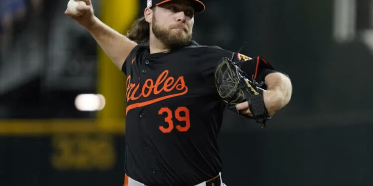 Jul 19, 2024; Arlington, Texas, USA; Baltimore Orioles pitcher Corbin Burnes (39) throws to the plate during the first inning against the Texas Rangers at Globe Life Field. Mandatory Credit: Raymond Carlin III-USA TODAY Sports