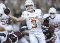 Nov 30, 2024; College Station, Texas, USA; Texas Longhorns quarterback Quinn Ewers (3) attempts a pass as Texas A&amp;M Aggies linebacker Scooby Williams (0) applies defensive pressure during the first quarter at Kyle Field. Mandatory Credit: Troy Taormina-Imagn Images