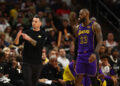 Oct 28, 2024; Phoenix, Arizona, USA; Los Angeles Lakers head coach JJ Redick with forward LeBron James (23) against the Phoenix Suns at Footprint Center. Mandatory Credit: Mark J. Rebilas-Imagn Images