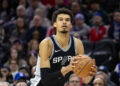 Dec 23, 2024; Philadelphia, Pennsylvania, USA; San Antonio Spurs center Victor Wembanyama (1) shoots the ball against the Philadelphia 76ers during the fourth quarter at Wells Fargo Center. Mandatory Credit: Bill Streicher-Imagn Images