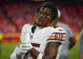 Aug 22, 2024; Kansas City, Missouri, USA; Chicago Bears safety Adrian Colbert (25) on the sidelines against the Kansas City Chiefs during the game at GEHA Field at Arrowhead Stadium. Mandatory Credit: Denny Medley-Imagn Images