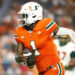 Sep 7, 2024; Miami Gardens, Florida, USA; Miami Hurricanes quarterback Cam Ward (1) runs with the football for a touchdown against the Florida A&amp;M Rattlers during the third quarter at Hard Rock Stadium. Mandatory Credit: Sam Navarro-Imagn Images