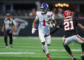 Dec 22, 2024; Atlanta, Georgia, USA; New York Giants wide receiver Malik Nabers (1) runs after a catch against the Atlanta Falcons in the fourth quarter at Mercedes-Benz Stadium. Mandatory Credit: Brett Davis-Imagn Images