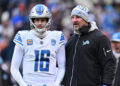 Dec 10, 2023; Chicago, Illinois, USA; Detroit Lions head coach Dan Campbell talks with quarterback Jared Goff (16) in the first half against the Chicago Bears at Soldier Field. credits: Jamie Sabau-USA TODAY Sports