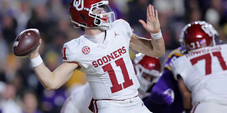 BATON ROUGE, LOUISIANA - NOVEMBER 30: Jackson Arnold #11 of the Oklahoma Sooners throws the ball during the first half against the LSU Tigers at Tiger Stadium on November 30, 2024 in Baton Rouge, Louisiana. (Photo by Jonathan Bachman/Getty Images)