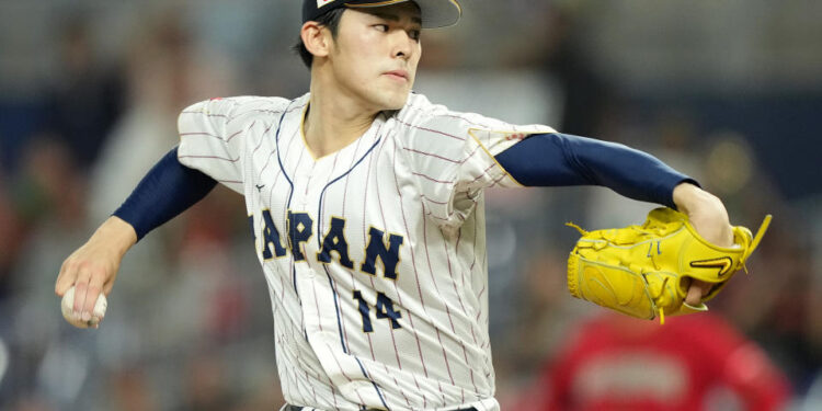 MIAMI, FLORIDA - MARCH 20: Roki Sasaki #14 of Team Japan pitches in the first inning against Team Mexico during the World Baseball Classic Semifinals at loanDepot park on March 20, 2023 in Miami, Florida. (Photo by Eric Espada/Getty Images)