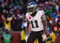 LANDOVER, MD - DECEMBER 22: A.J. Brown #11 of the Philadelphia Eagles celebrates after catching a pass for a touchdown against the Washington Commanders during the first half of the game at Northwest Stadium on December 22, 2024 in Landover, Maryland. (Photo by Scott Taetsch/Getty Images)